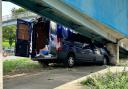 A blue van was damaged in a crash