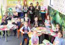 Children at Southwood with teachers, the mayor and Bookmark charity's Emily Jack