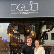 Matt and Lauren Redgrave, owners of Ped's Pizza pictured outside their restuarant