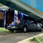 A blue van was damaged in a crash
