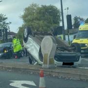 An overturned car was pictured after the crash in Pettits Lane
