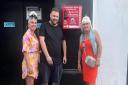 Ricky Hayden's sister April, Danny Woodhouse and Ricky's mum Sue Hedges with the bleed kit installed outside Jukebox LDN in South Street