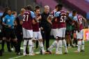 West Ham United manager David Moyes speaks to players during the drinks break