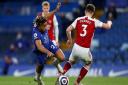 Chelsea's Reece James (left), pictured battling Arsenal's Kieran Tierney for the ball, was born in Ilford.