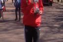 Lydia Hellam, from the Coopers' Company and Coborn School in Upminster, after winning the London Mini-Marathon