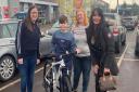 L-R: Samm Cleaver, who donated a bike lock, Charlie Gambleton, Rachel Parrott and Susan Hastings