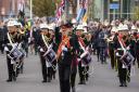 Drummers march through Romford on Remembrance Sunday