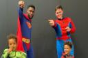 Angelio (l) and colleague Zach encouraged children to dress up as superheroes for Mental Health Awareness Week
