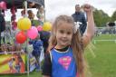 Five-year-old Jessica Cooper dressed up as superwoman for the dog show