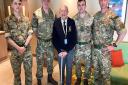 Ron with members of the Royal Marines on the Boudicca cruise ship. Picture: Jennie Bardrick
