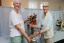 Rush Green Community Association's Flower Show. Secretary Joy Emerson (right) presenting Janice Aitken (left) with the John Hooker Highest Points Cup and the Best in Show cup. Picture: Melissa Page