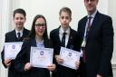Redden School Pupils Joshua Kirby, George Attrill and Amy Horsely with headteacher Paul Ward