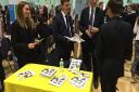 Former pupils Laura Matthews, Tom Bryant and Nathan Murphy returned to Coopers Coborn School with employer EY for at a Careers Convention