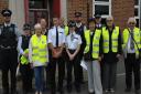 Streetwatch volunteers with police officers