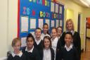 Crowlands Primary School headteacher Hayley McClenaghan celebrates with pupils after being rated 