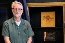 Billy Bragg and tribute plaque to Neil Young