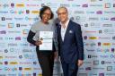 Nichole Goodison proudly recieving a 'Small Business Sunday' award from former Dragon Theo Paphitis last Friday (February 23)