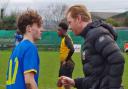 JW 21 Feb 2024 soccer romford soccer romford west essex Dan Spinks gives instructions to recent signing Reece McGovern picture by credit BOB KNIGHTLEY