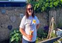 Laura wearing her Saint Francis Hospice t-shirt.
