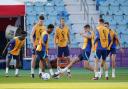 Harry Kane (centre) looks on as England train ahead of their World Cup quarter-final with France