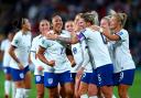 Lauren James celebrates one of her two goals for England