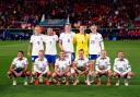 England line up before their game against China