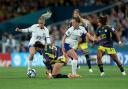 England's Alessia Russo and Keira Walsh battle against Colombia