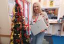 Parklands School office manager Clare Whiffin with the laptop gifts