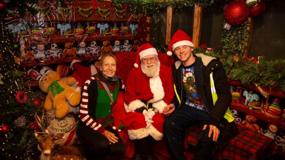 Romford Recorder: Ciaran White (right) and Gill Newton with Santa at Havering Christmas Land event at Harrow Lodge Park. Romford Recorder: Ciaran White (right) and Gill Newton with Santa at Havering Christmas Land event at Harrow Lodge Park.
