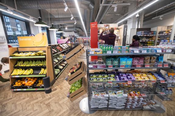 Romford Recorder: Fruit stand - staff near the tills Romford Recorder: Fruit stand - staff near the tills