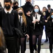 Pupils are being asked to wear masks and test regularly once their back at school