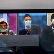 Passengers wearing face masks on the Jubilee line