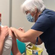 Andy Daly receiving his jab, from nurse Sharon Wright, at the King George hub.