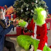Andrea Thomas, commercial van sales executive at TrustFord, with Junior Miss Galaxy Essex Amber Hood dressed as the Grinch