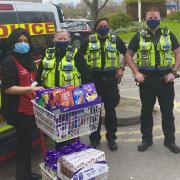 British Transport Police PCs Mesher, Piper-Harfield and Ryan Cord deliver Easter eggs to NHS staff.