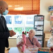 Health secretary Sajid Javid speaking to residents of Willows Care Home