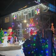The Merritt home lit up with festive decorations in Prestwood Drive.