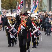Drummers march through Romford on Remembrance Sunday