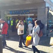 Police officers outside Barclays in South Street, Romford this morning (October 6)