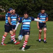 Craig Ratford of Old Cooperians kicking a conversion against Upminster