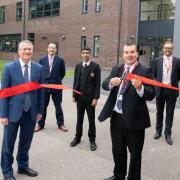 MP Andrew Rosindell and Councillor Robert Benham unveiling a new £6.3m extension to the Marshalls Park Academy in Romford.
