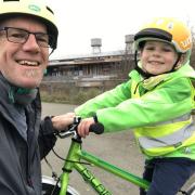 On average Ezra cycles 6.8 miles every day with dad Sean