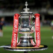 The FA Cup trophy on display at a match earlier this season