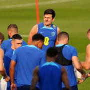 Harry Maguire looks on during an England training session at the World Cup