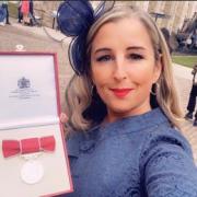 Claire Saunders, 42, pictured with her British Empire Medal