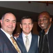 Event organiser Jason Beard with former boxing champion James Cook (right) and friend Bobby Arthey