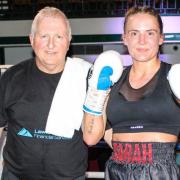 Sarah with Alec Wilkey, her trainer, after winning her professional boxing debut at York Hall.