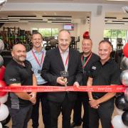 Ray Morgon, leader of Havering Council (centre), officially opens the site alongside Everyone Active staff.