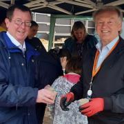 Havering Council members Tim Ryan and Graham Williamson at the garden planting