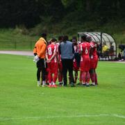 Athletic Newham players huddle before their match on Saturday